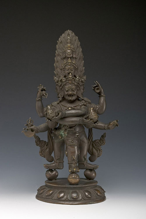Tibet, 18th century, copper alloy, dharmapala with three legs, private collection.