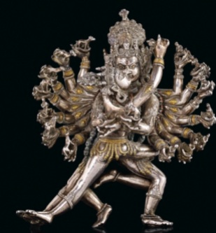 Circa 15th century, Tibet, Hevajra and consort, silver with gold inlay, private collection, photo by Christie's .