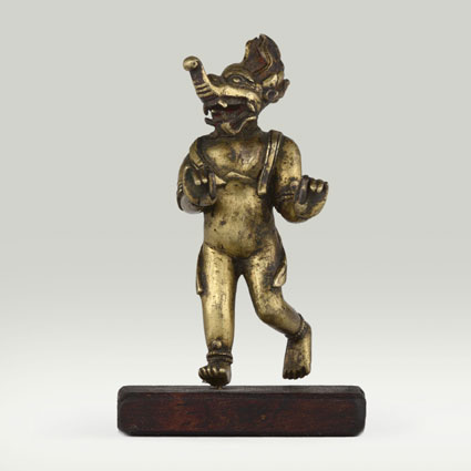 M-17th c., Tibet, Makaravaktra, brass, 6,8 cm, human hide? on back, Fondation Alain Bordier